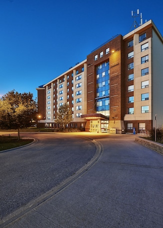 Front of property - evening/night. Residence & Conference Centre - Barrie