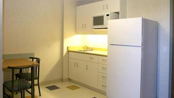 Full-size fridge, microwave, dining tables