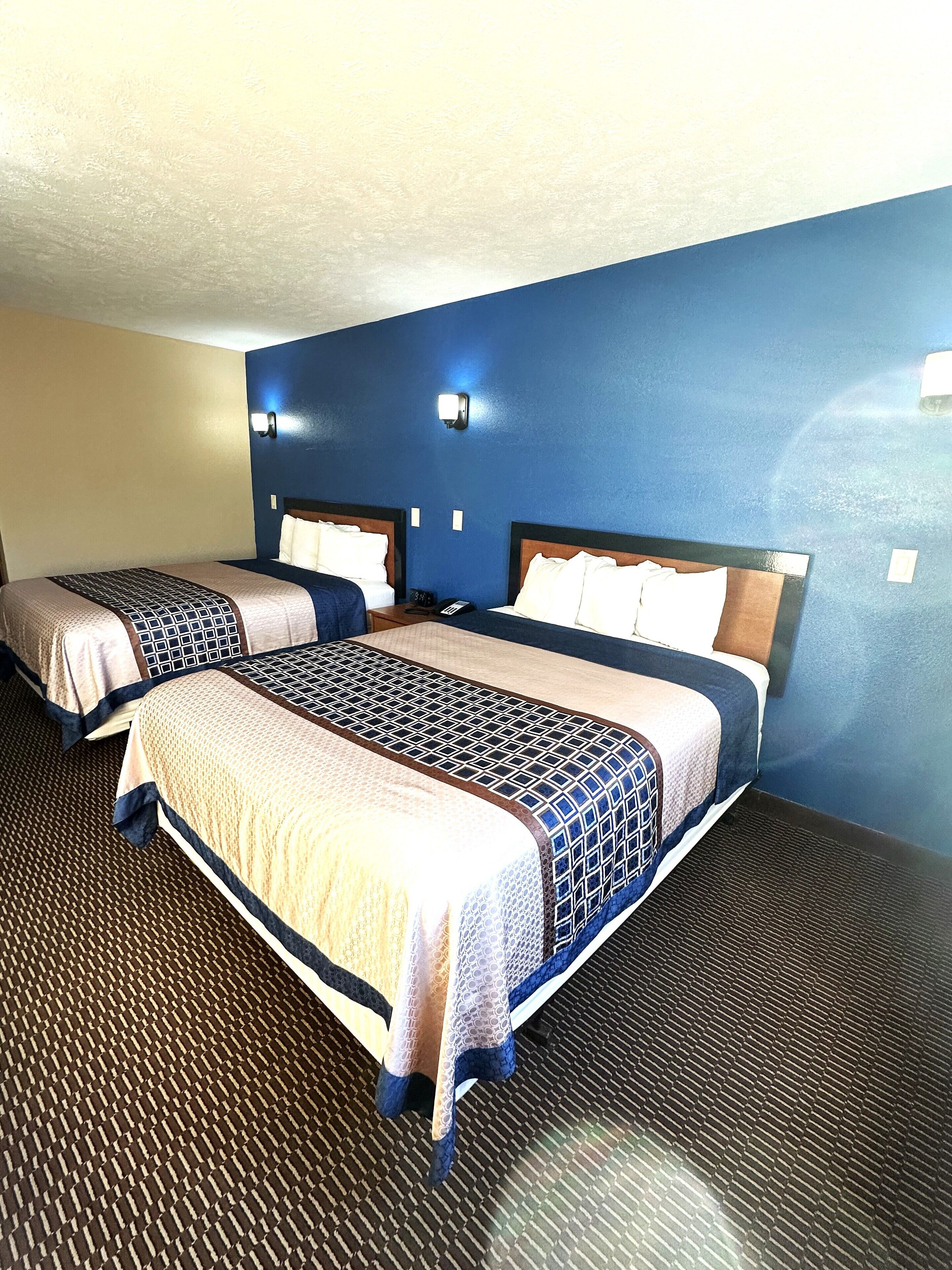 Standard Room, 2 Queen Beds | Living area | TV