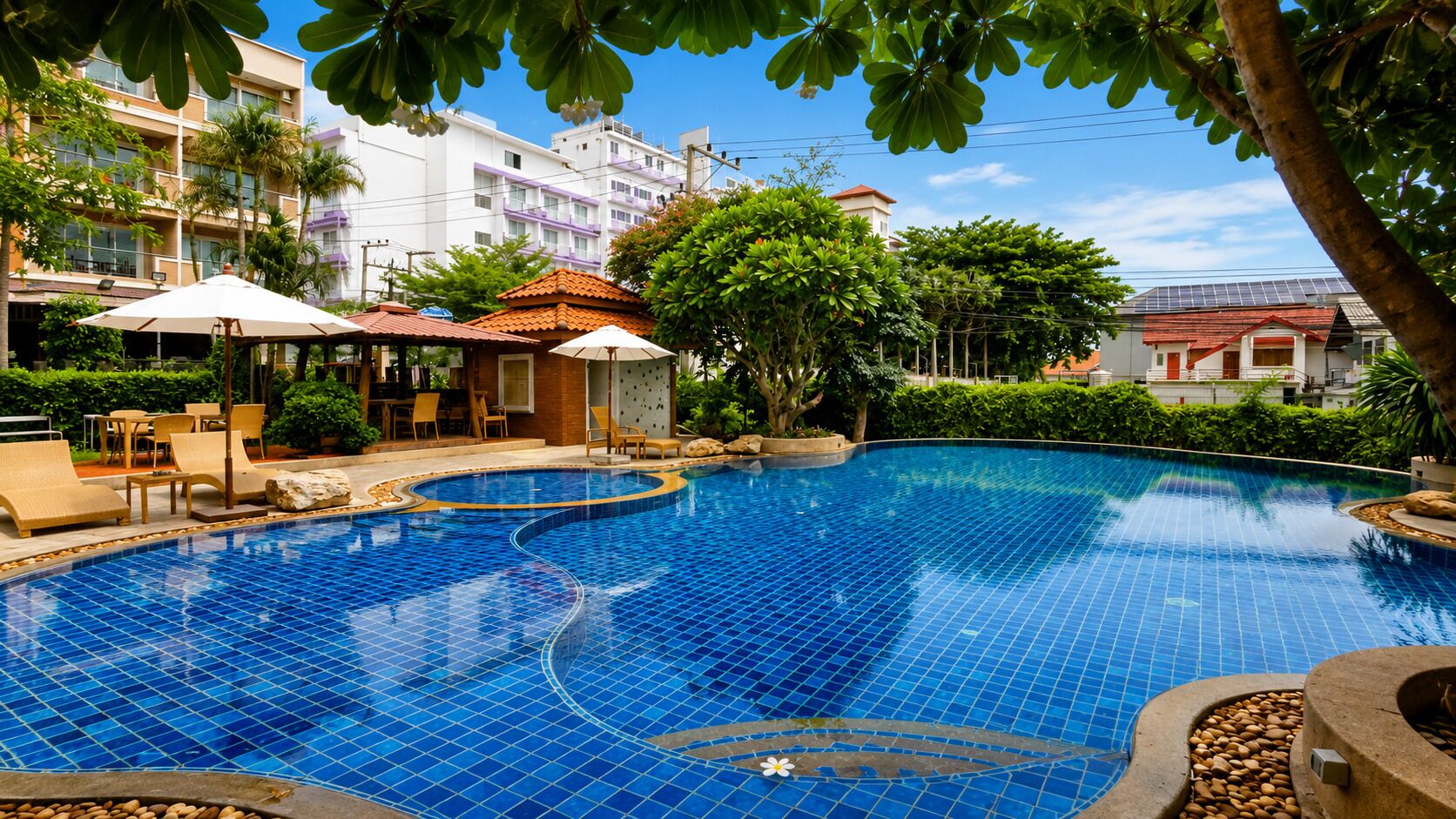 Outdoor pool, pool umbrellas, pool loungers