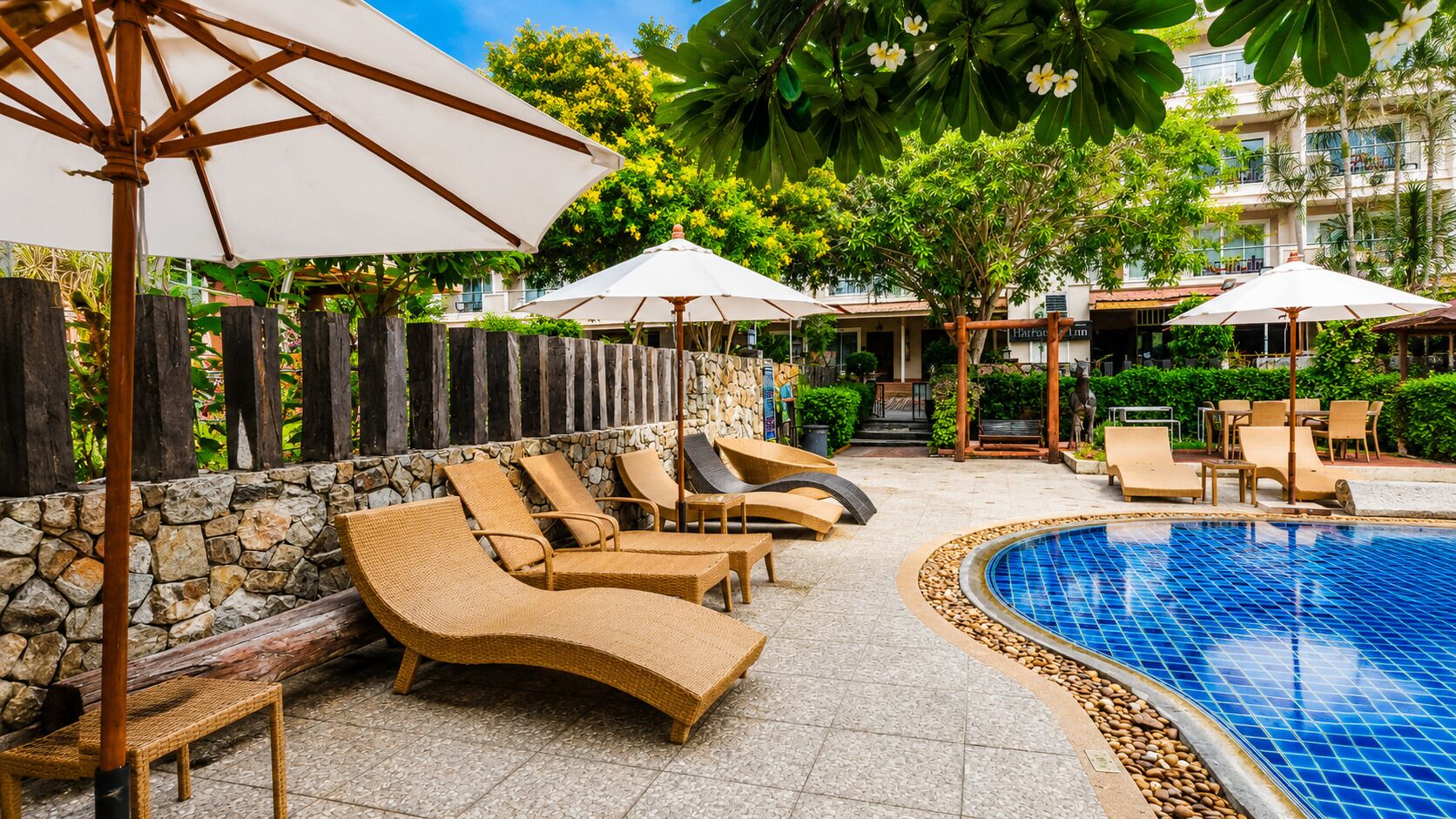 Outdoor pool, pool umbrellas, sun loungers