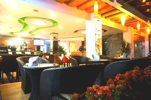 Breakfast, lunch, dinner served; local cuisine 