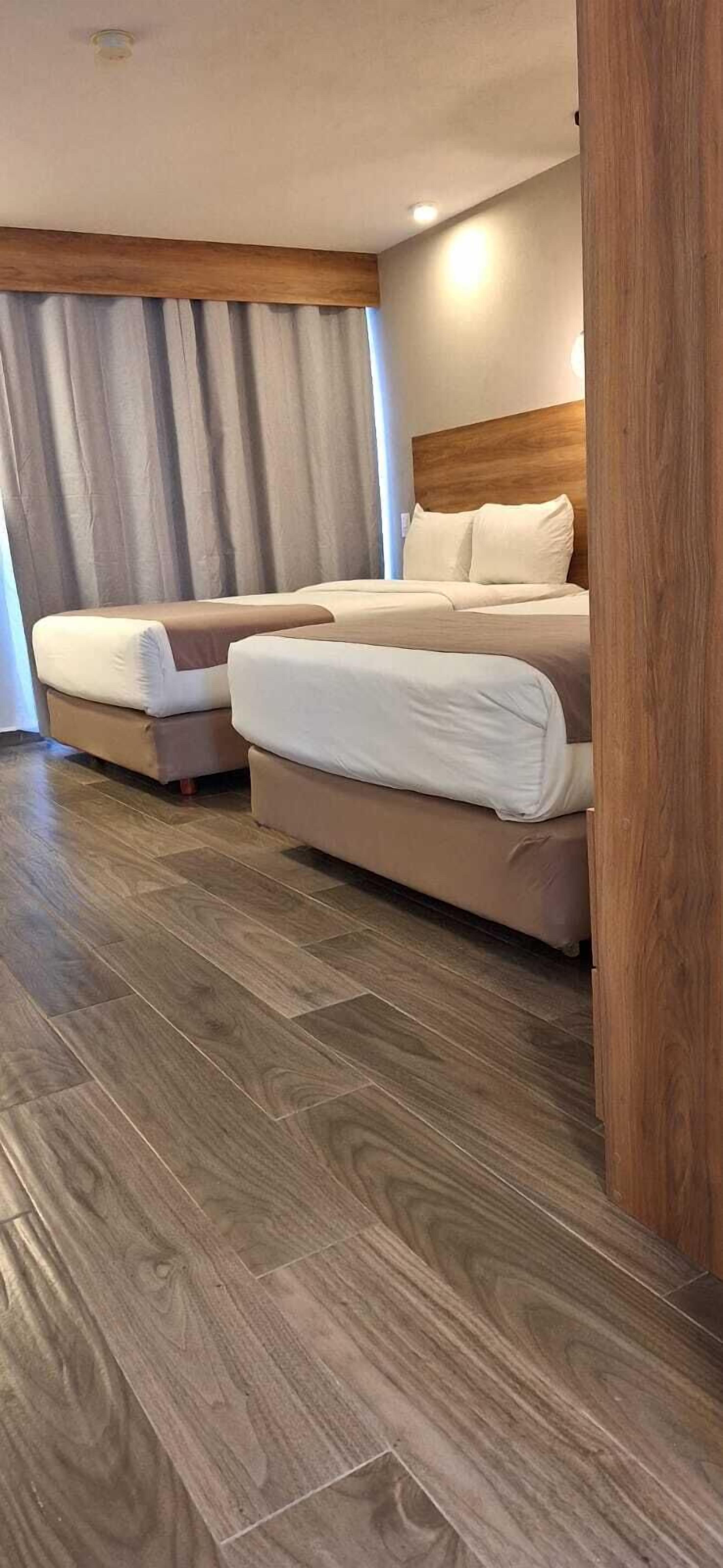 Foto - La Posada Hotel y Suites