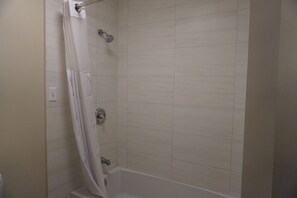 Standard Room, 1 Queen Bed | Bathroom | Combined shower/bathtub, hair dryer, towels