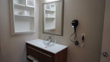 Standard Room, 1 King Bed | Bathroom | Combined shower/tub, hair dryer, towels