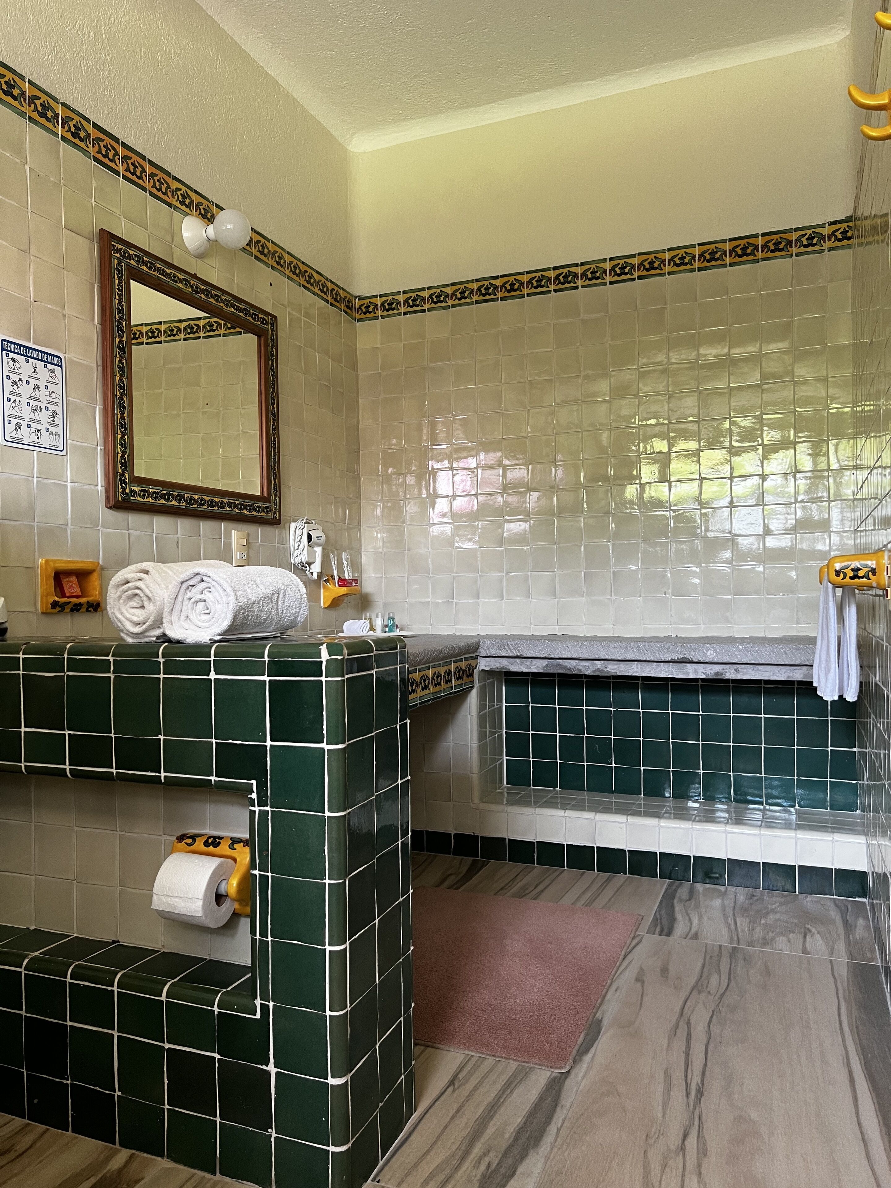 standard double room | bathroom | shower, hair dryer, towels