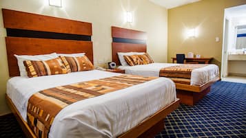 Double Room | Minibar, in-room safe, iron/ironing board, free cots/infant beds
