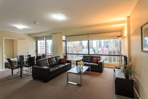 Standard Three Bedroom Apartment | Living area - Paramount Serviced Apartments (Melbourne)