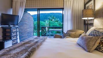 Chambre Exécutive, 1 trÚs grand lit | Literie de qualité supérieure, minibar, coffres-forts dans les chambres