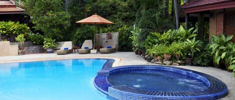 Outdoor pool, pool umbrellas, sun loungers