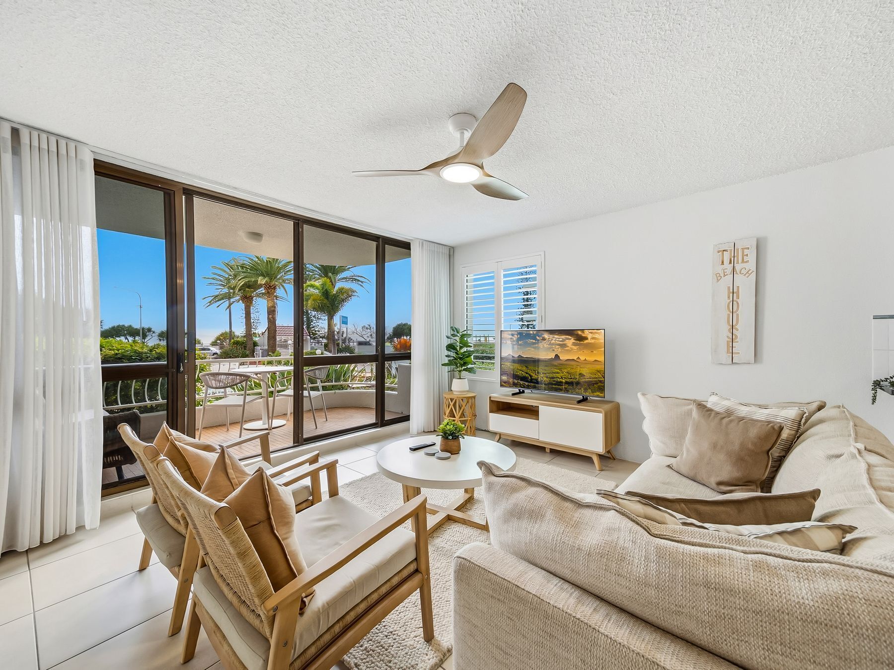 Ocean View - Two Bedroom Apartment | Living area | 50-inch TV with satellite channels, table tennis, streaming services
