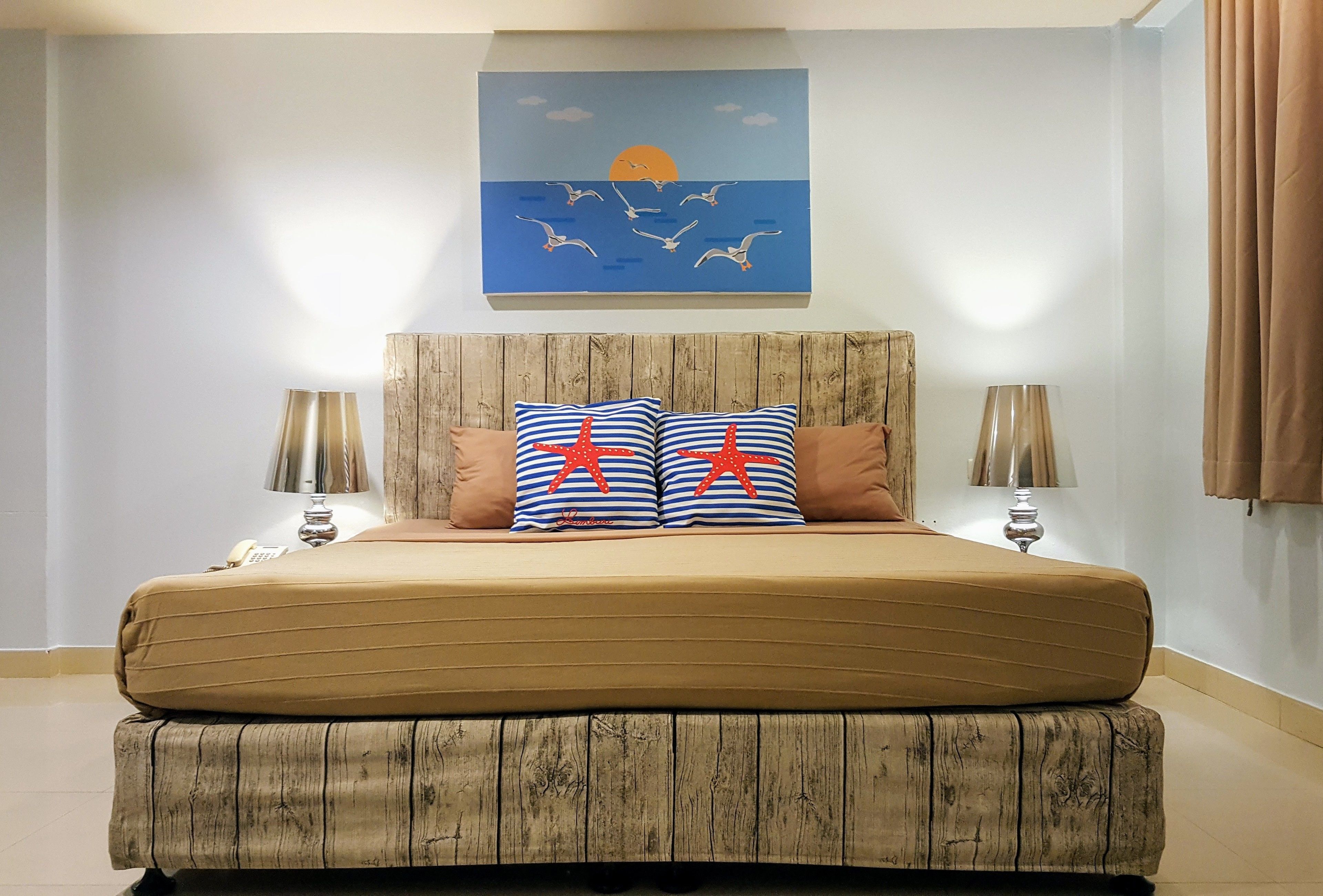 Room, 1 Queen Bed | Minibar, in-room safe, individually furnished, iron/ironing board