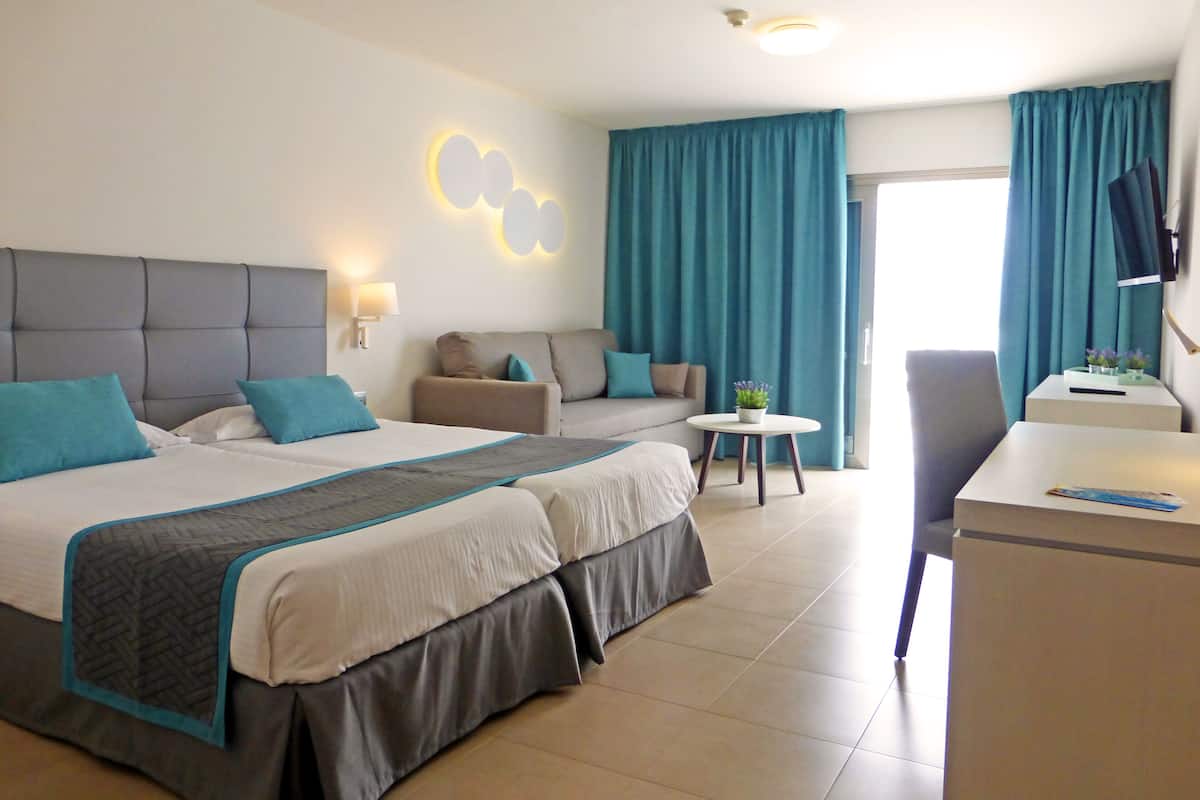 Down duvets, minibar, in-room safe, desk