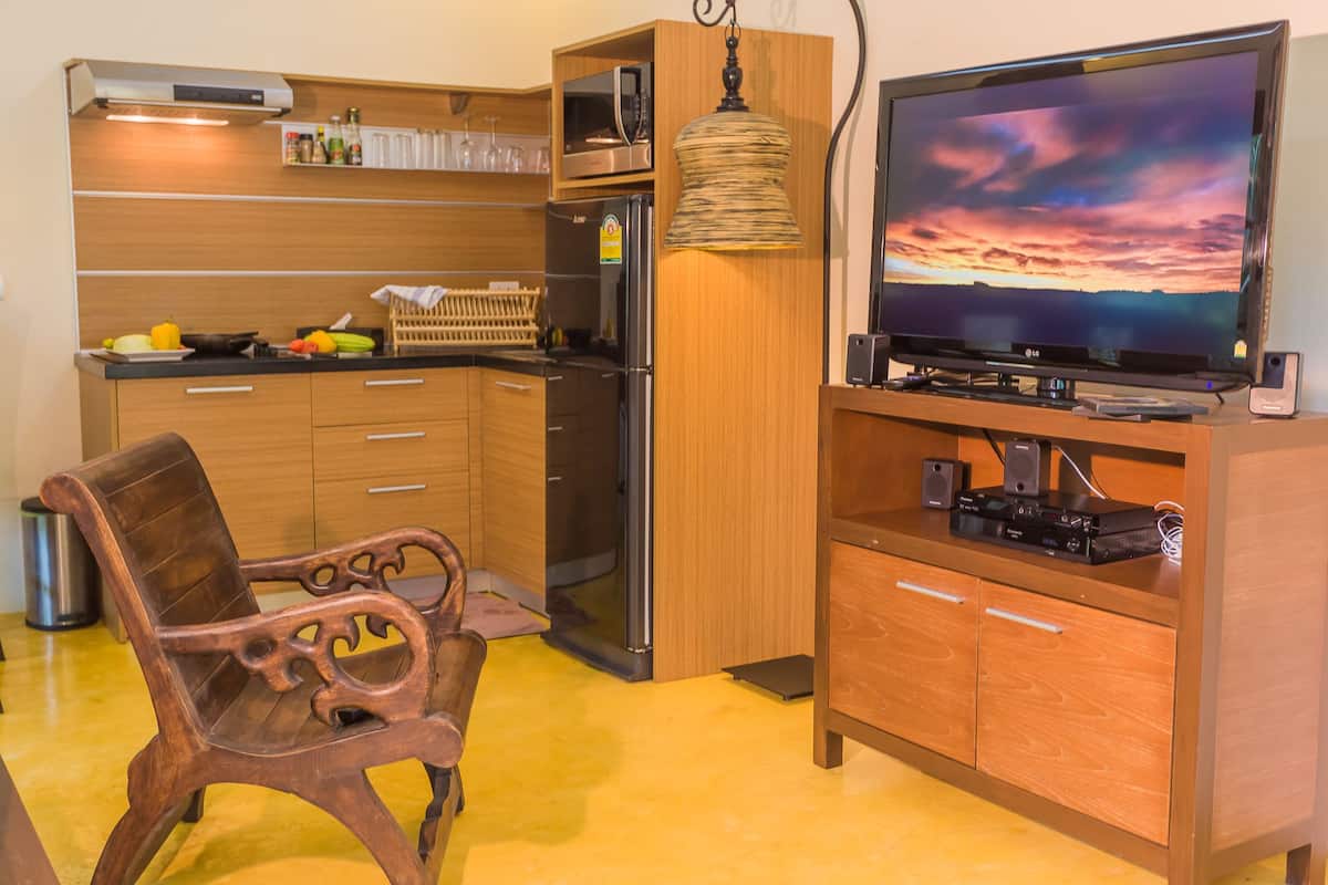 1 bedroom pool villa | living area | tv