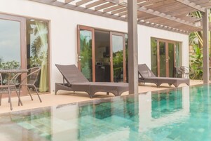 Outdoor pool, sun loungers