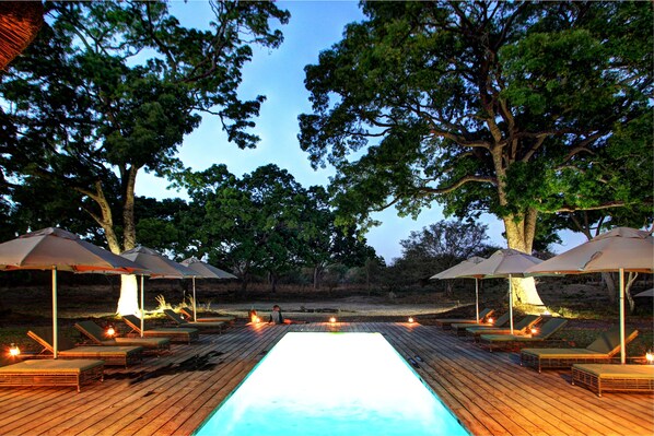 Outdoor pool, pool umbrellas, sun loungers