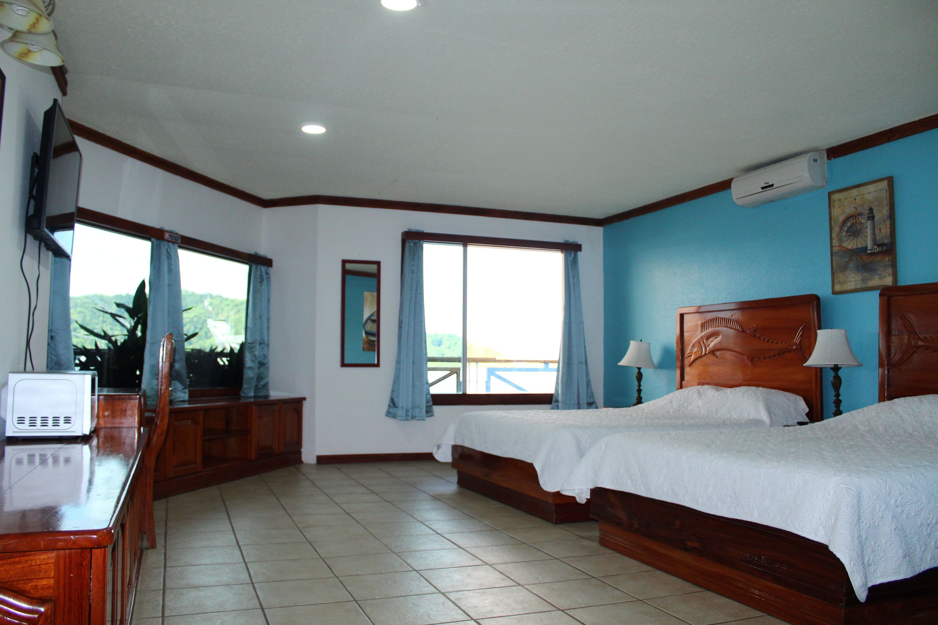 suite, 2 queen beds | 1 bedroom, premium bedding, desk, blackout curtains