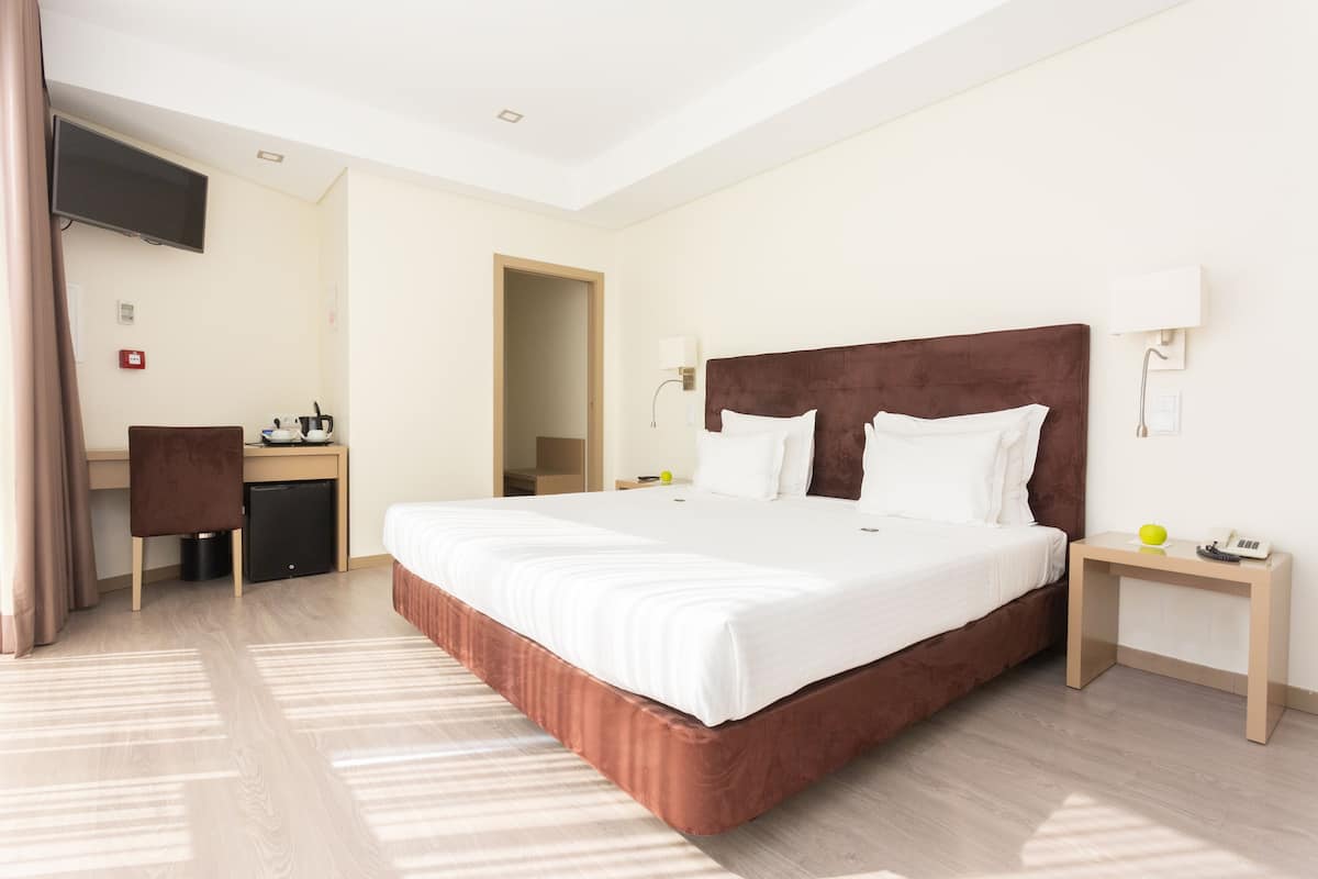 Habitación romántica, 1 cama King size | 1 habitación y caja de seguridad en la habitación