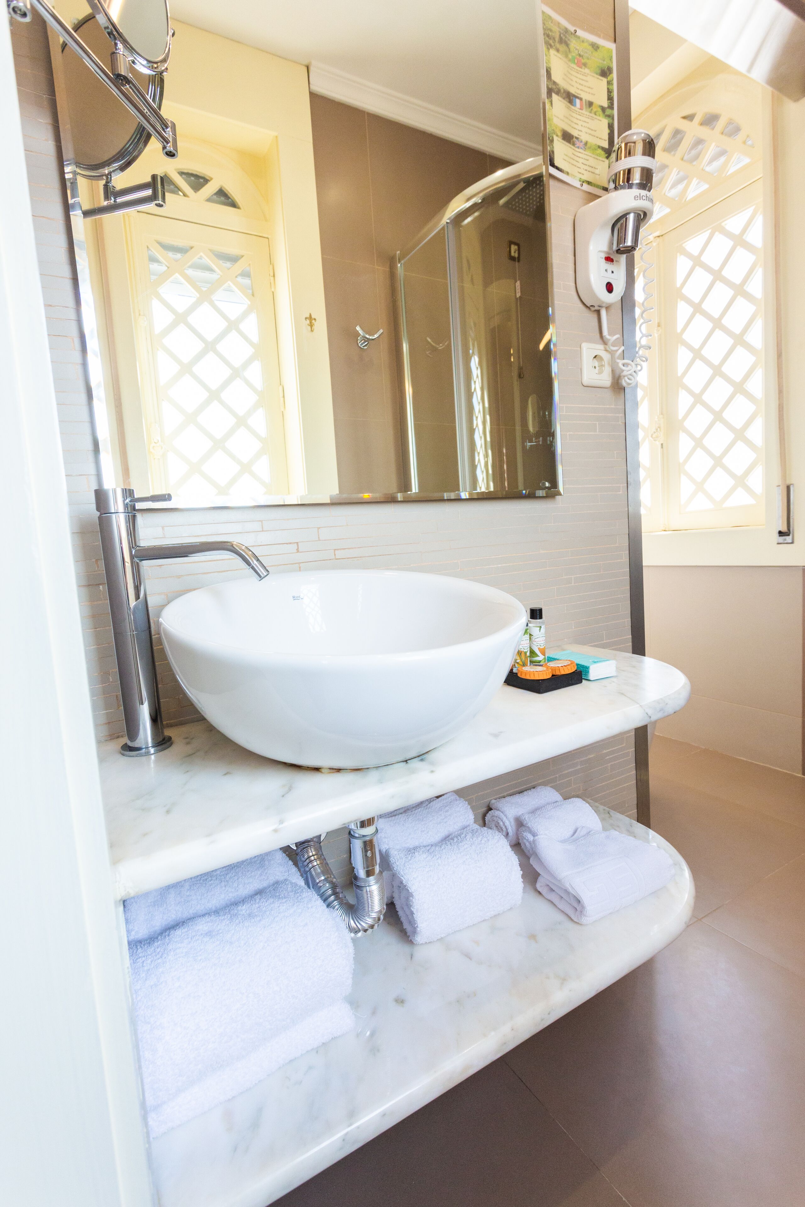 room | bathroom | free toiletries, hair dryer, slippers, towels