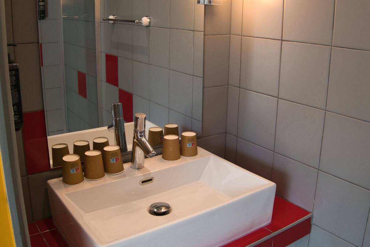 shower, eco-friendly toiletries, hair dryer, towels