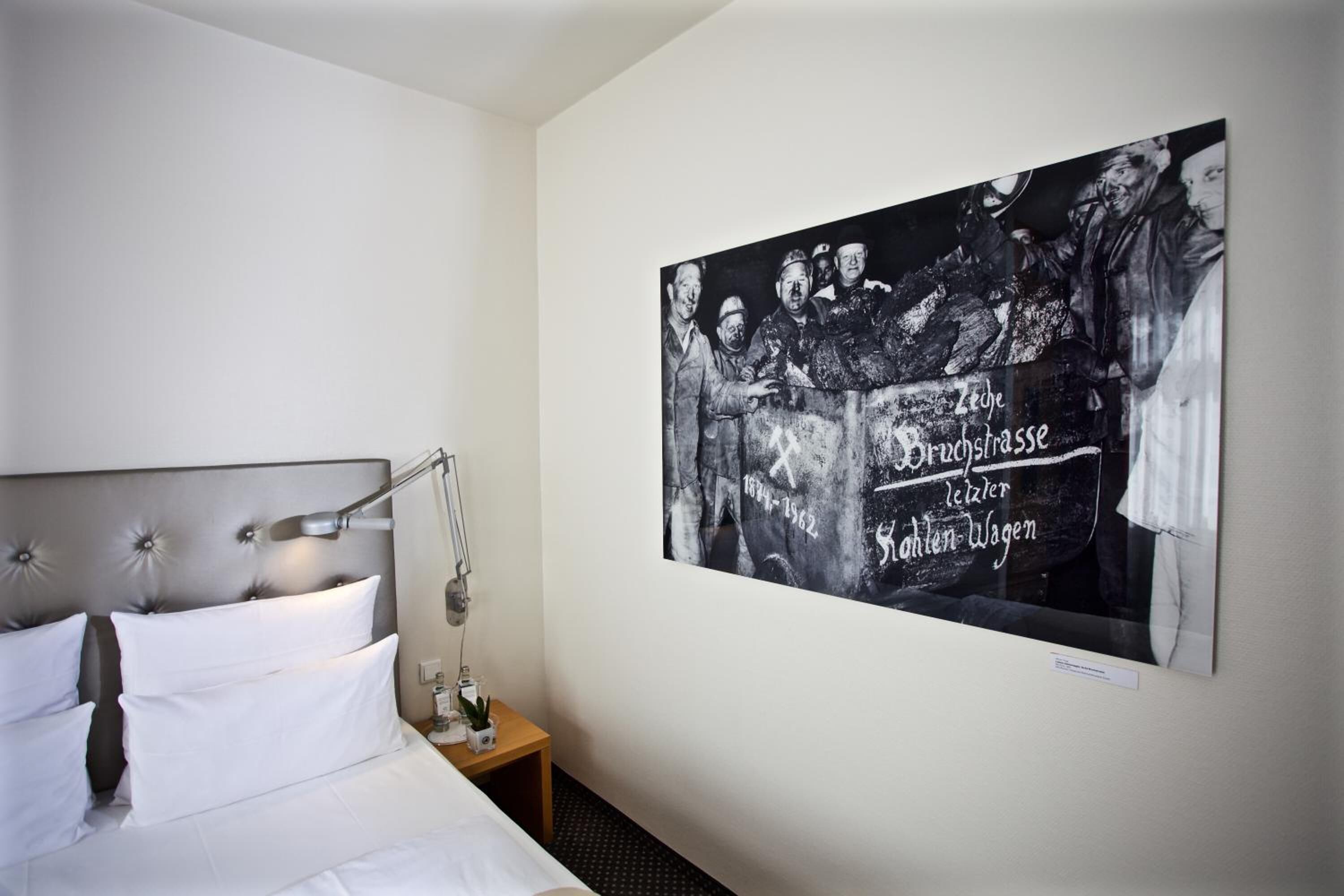 hypo-allergenic bedding, in-room safe, desk, blackout curtains