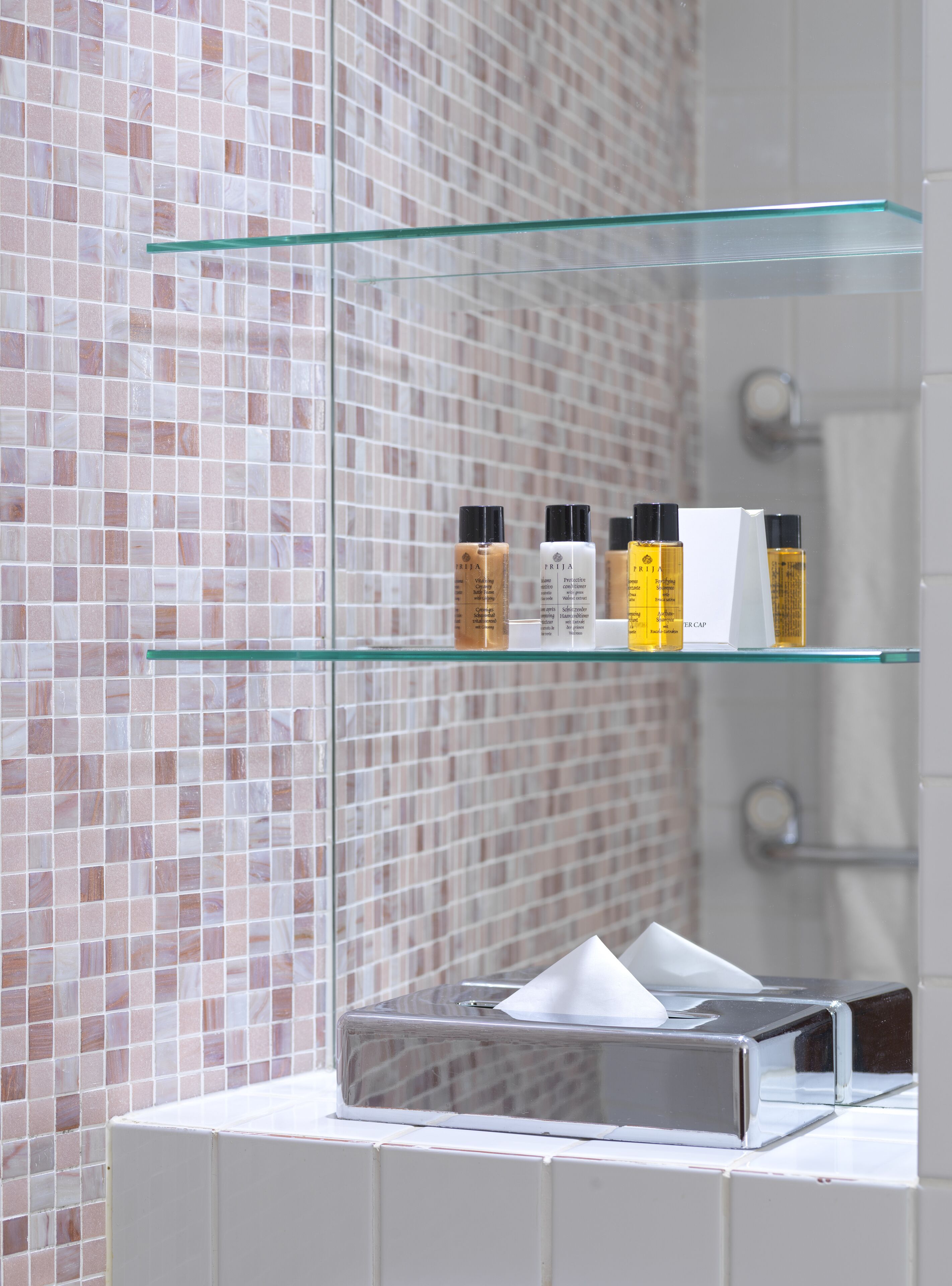 shower, designer toiletries, hair dryer, towels