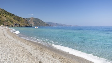 Private beach, white sand, sun-loungers, beach umbrellas