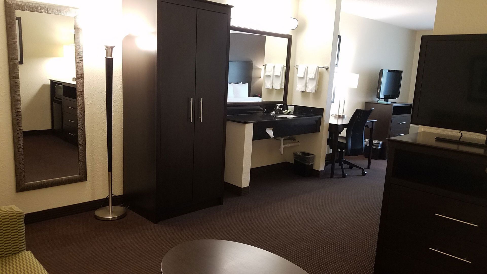 Desk, laptop workspace, blackout drapes, soundproofing