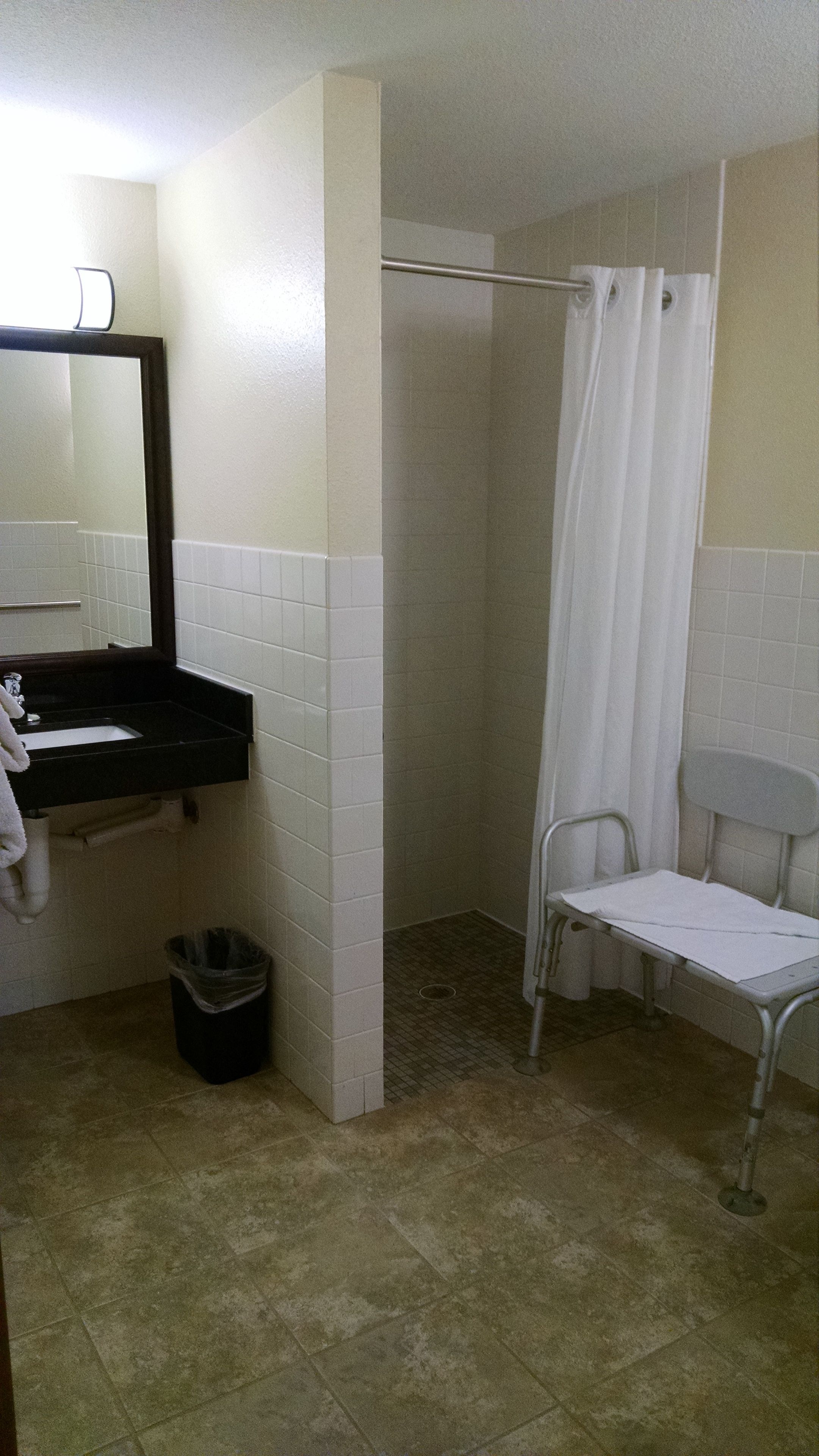 room, 1 king bed, accessible, non smoking | bathroom | combined shower/bathtub, hair dryer, towels