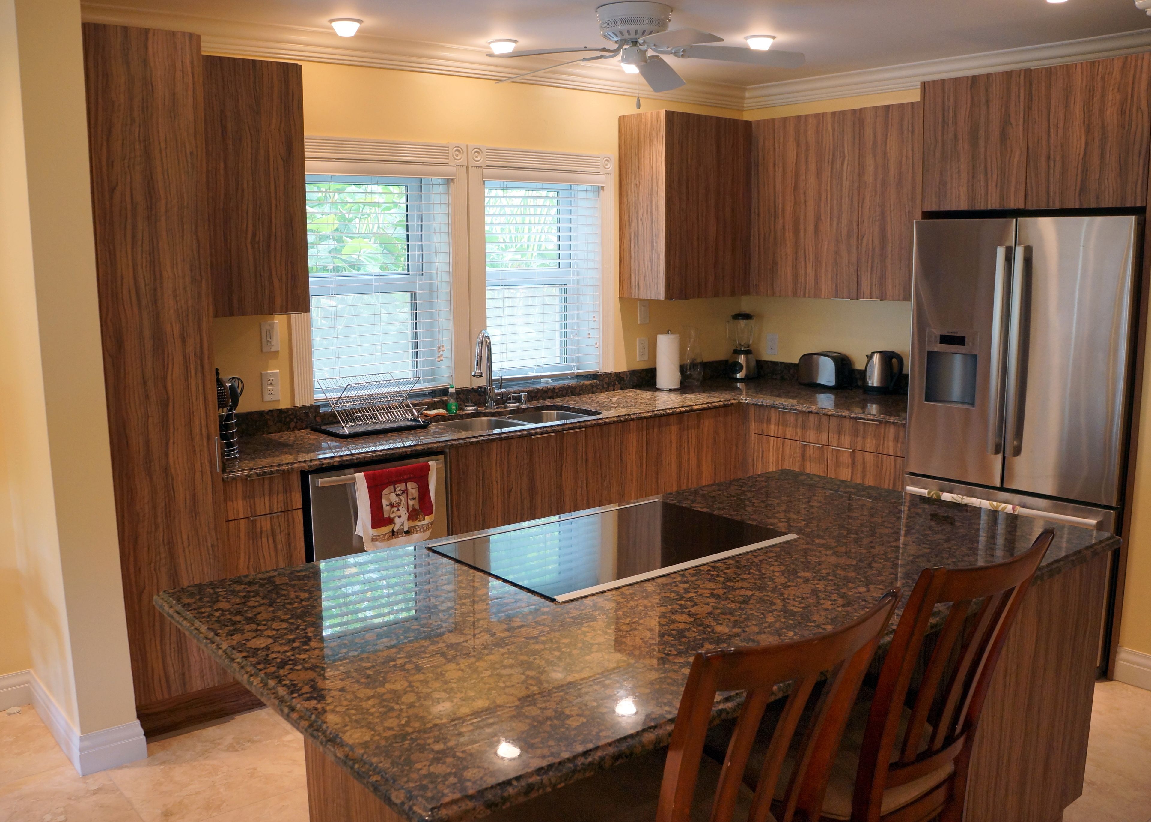 full-sized fridge, microwave, stovetop, dishwasher