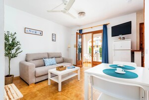 Apartment, 2 Bedrooms, Terrace | Living area | 22-inch LCD TV with cable channels, TV
