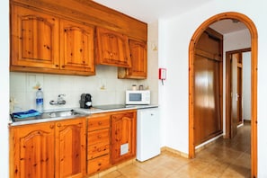 Departamento, 1 habitación, Terraza | Cocina privada | Refrigerador con congelador, microondas y parrilla de estufa