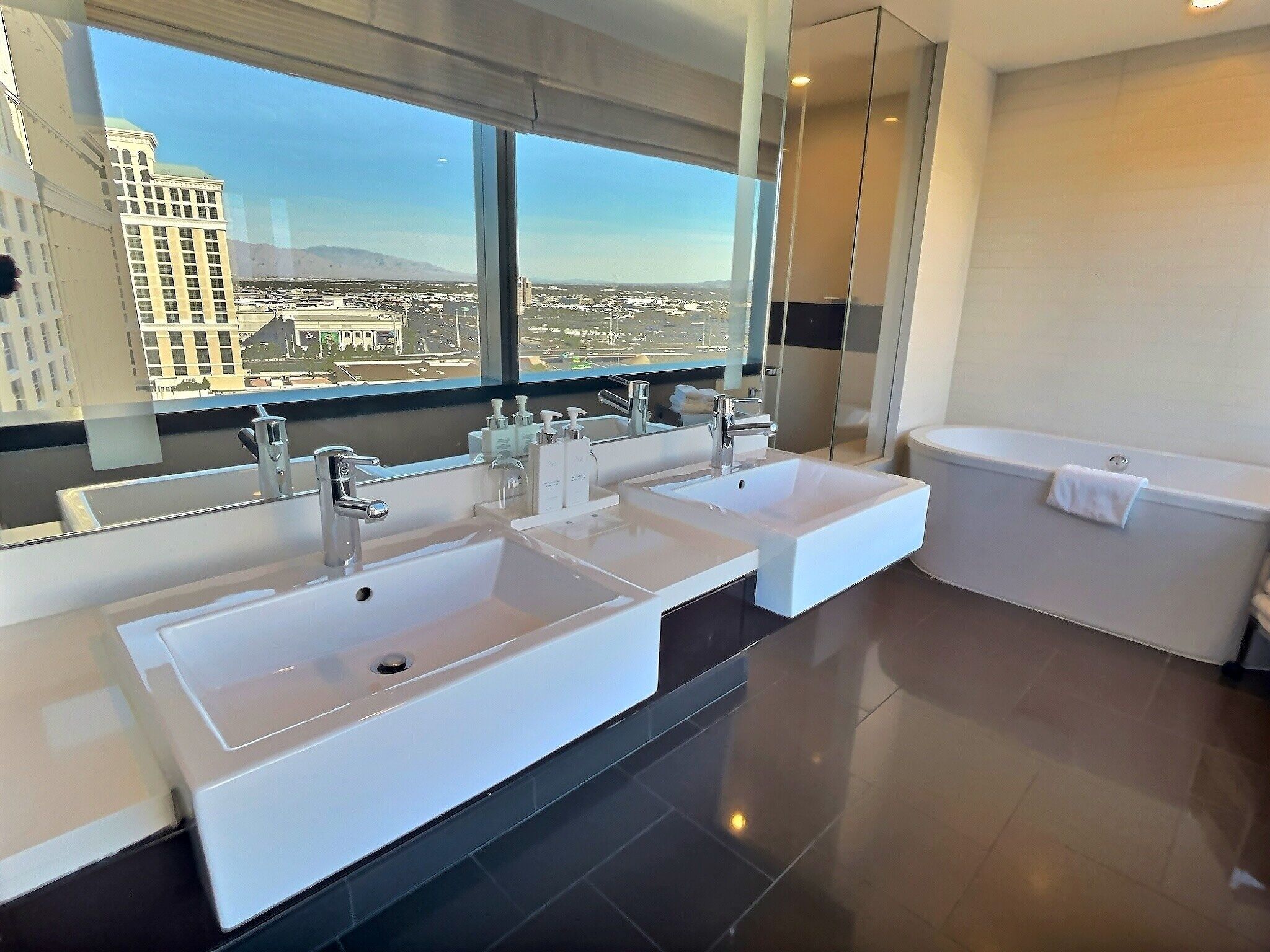 city corner 1 br | bathroom | separate bathtub and shower, deep-soaking bathtub, designer toiletries