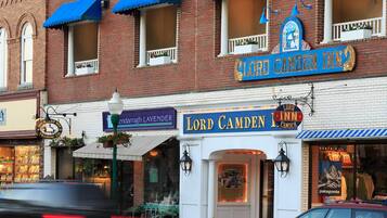 A brick building with a sign for 'Lord Camden Inn' and a storefront for 'Endarragh Lavender'.