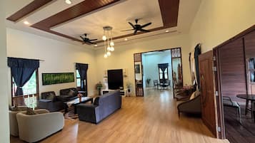 Exclusive Bungalow | Living area | 32-inch LED TV with digital channels