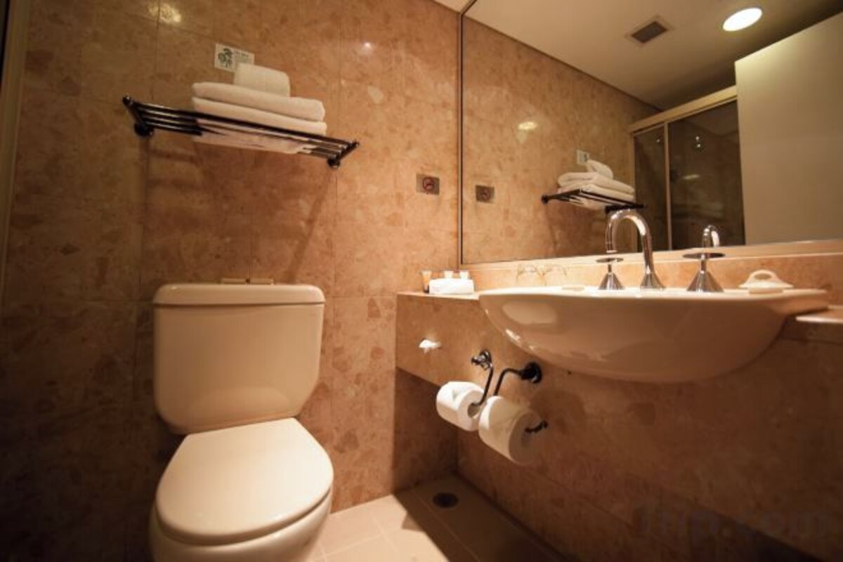 Shower, eco-friendly toiletries, hair dryer, towels