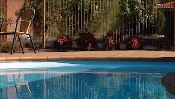 Seasonal outdoor pool, open 7:00 AM to 9:00 PM, sun loungers