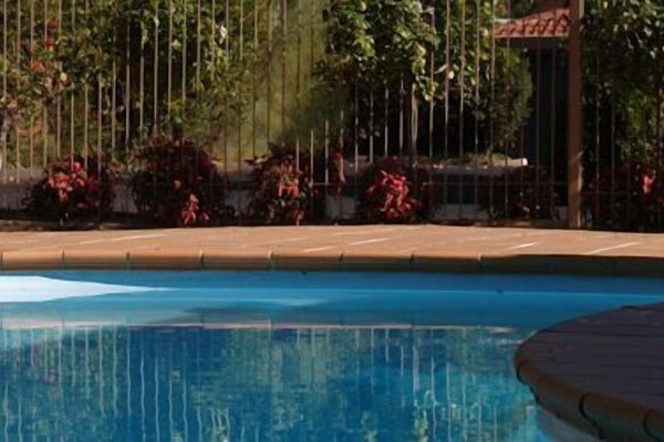 Seasonal outdoor pool, open 7:00 AM to 9:00 PM, pool loungers