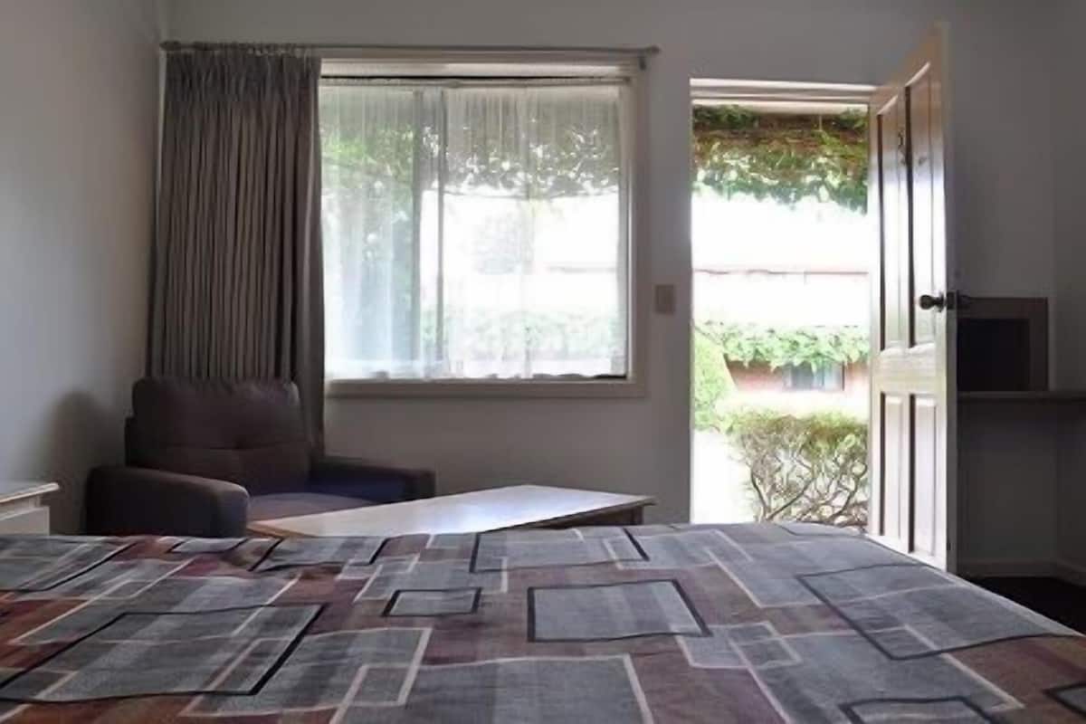 Select Comfort beds, desk, blackout drapes, soundproofing