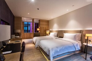Premium bedding, free minibar, in-room safe, desk