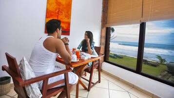 Suite Room | Couples’ dining | 2 restaurants, breakfast served