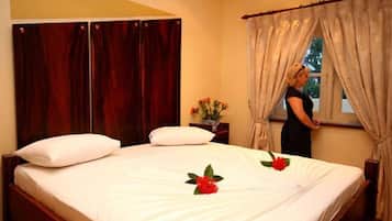 Deluxe Room | 1 bedroom, minibar, in-room safe, individually decorated