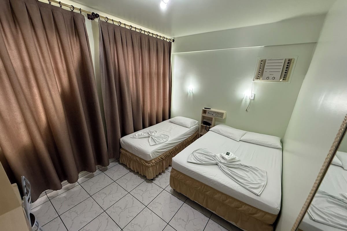 Standard Room, Multiple Bedrooms, Air conditioning, Executive Level | Minibar, laptop workspace, blackout curtains, soundproofing