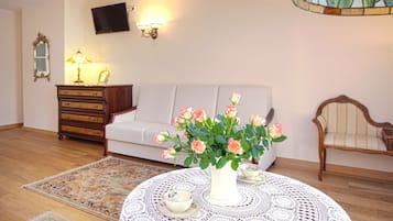 40-inch flat-screen TV with satellite channels, TV