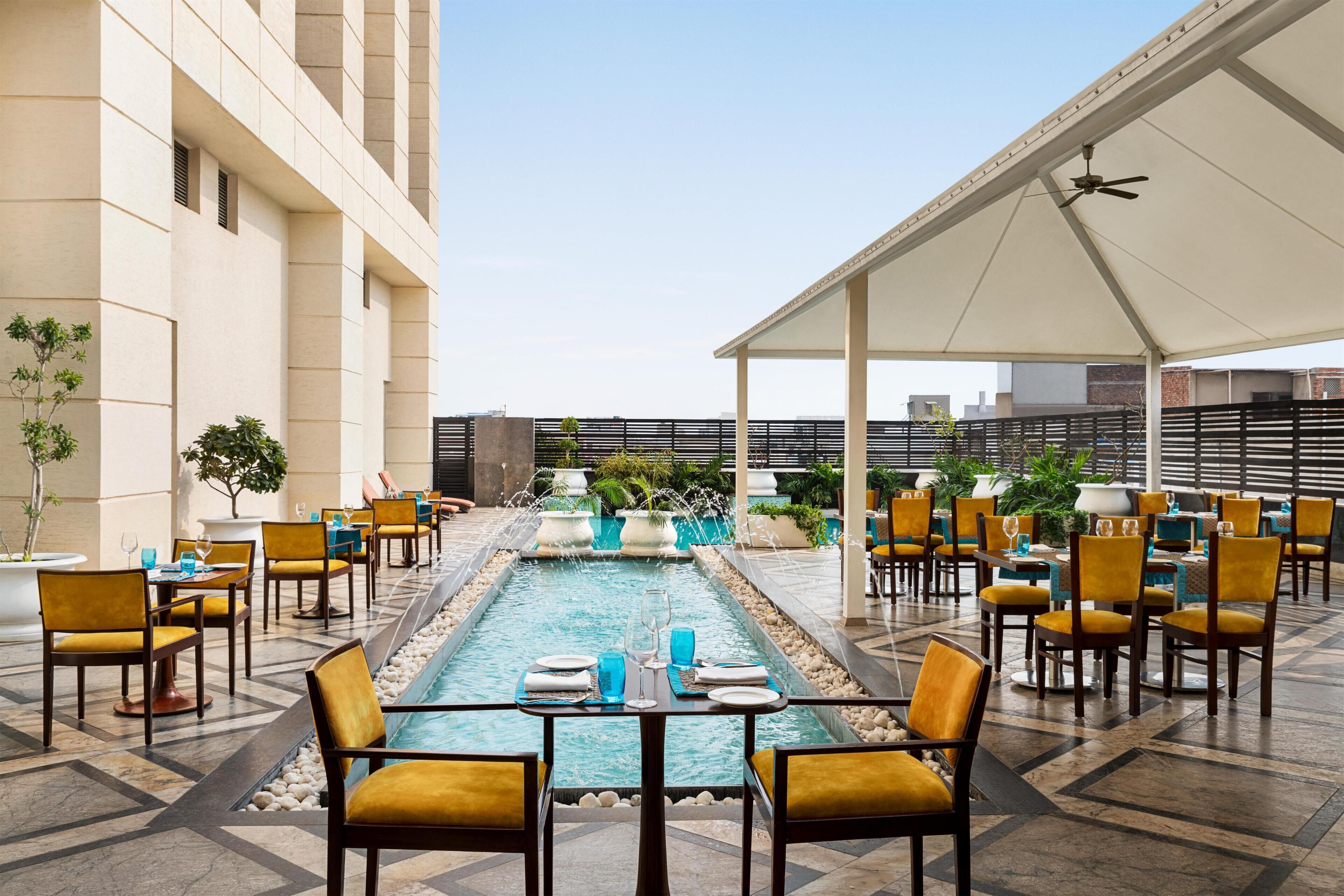 Outdoor pool, free pool cabanas, pool umbrellas