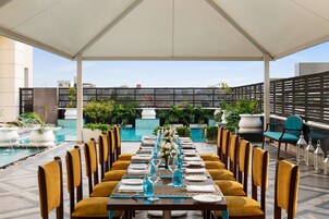 Outdoor pool, free cabanas, pool umbrellas