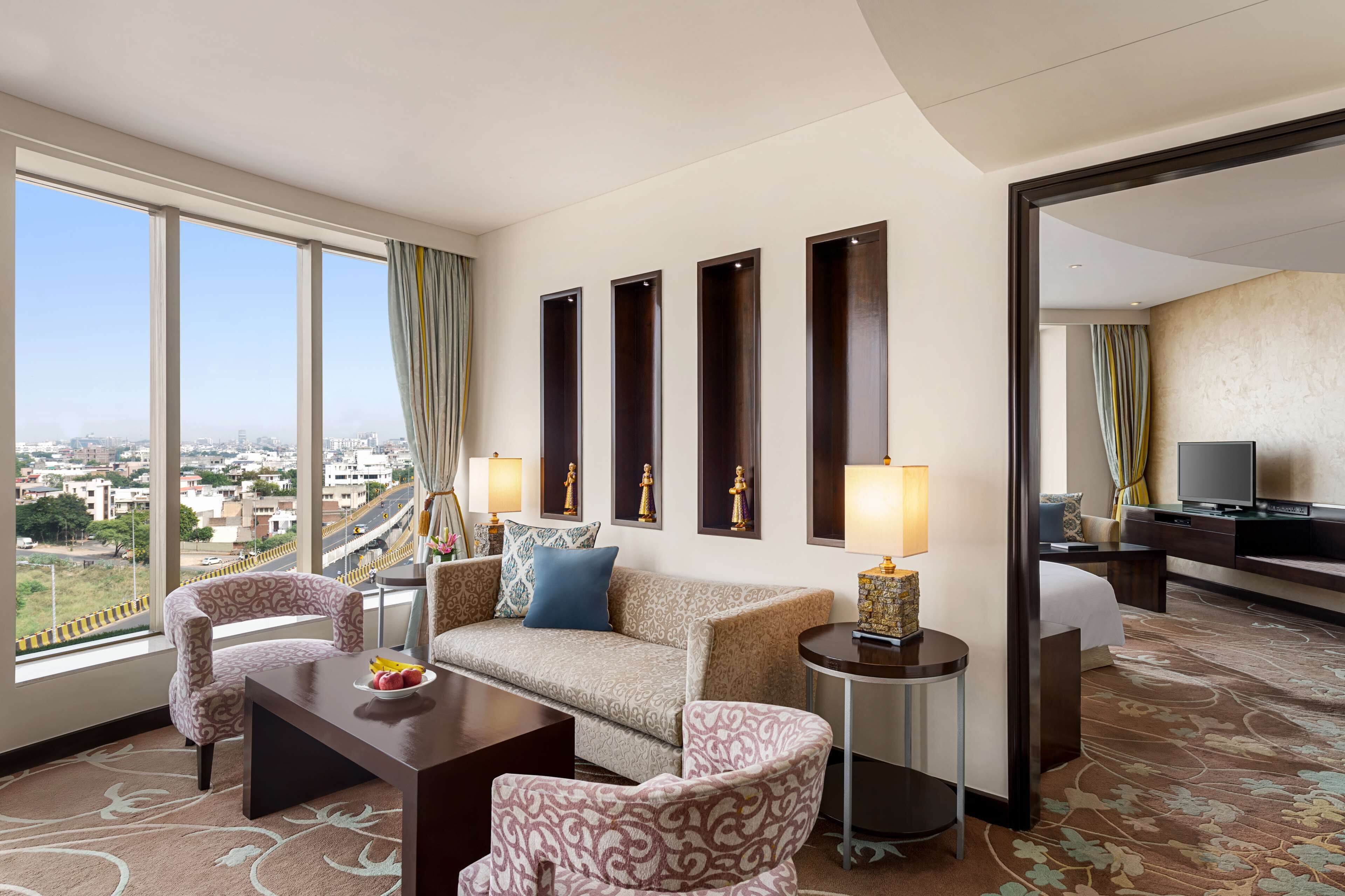 suite, 1 bedroom, club lounge access (aravalli range view) | living area | 37-inch led tv with satellite channels, tv