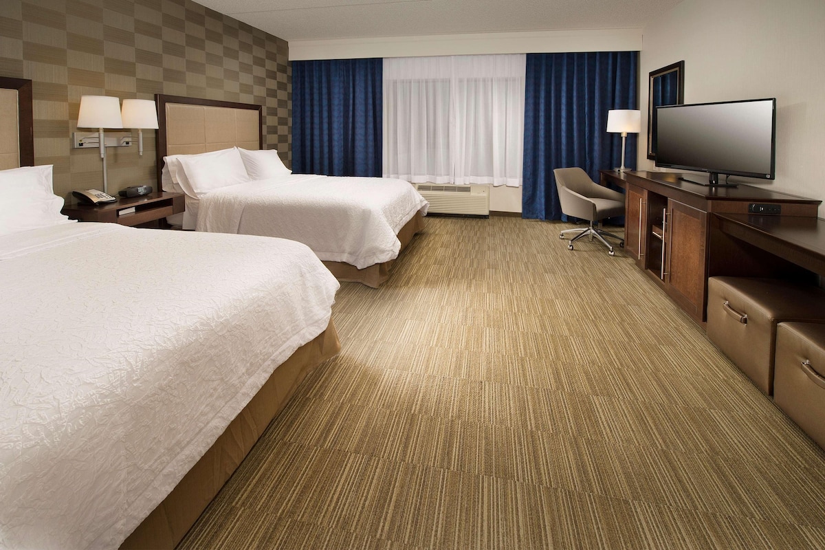 Hypo-allergenic bedding available, down comforters, desk