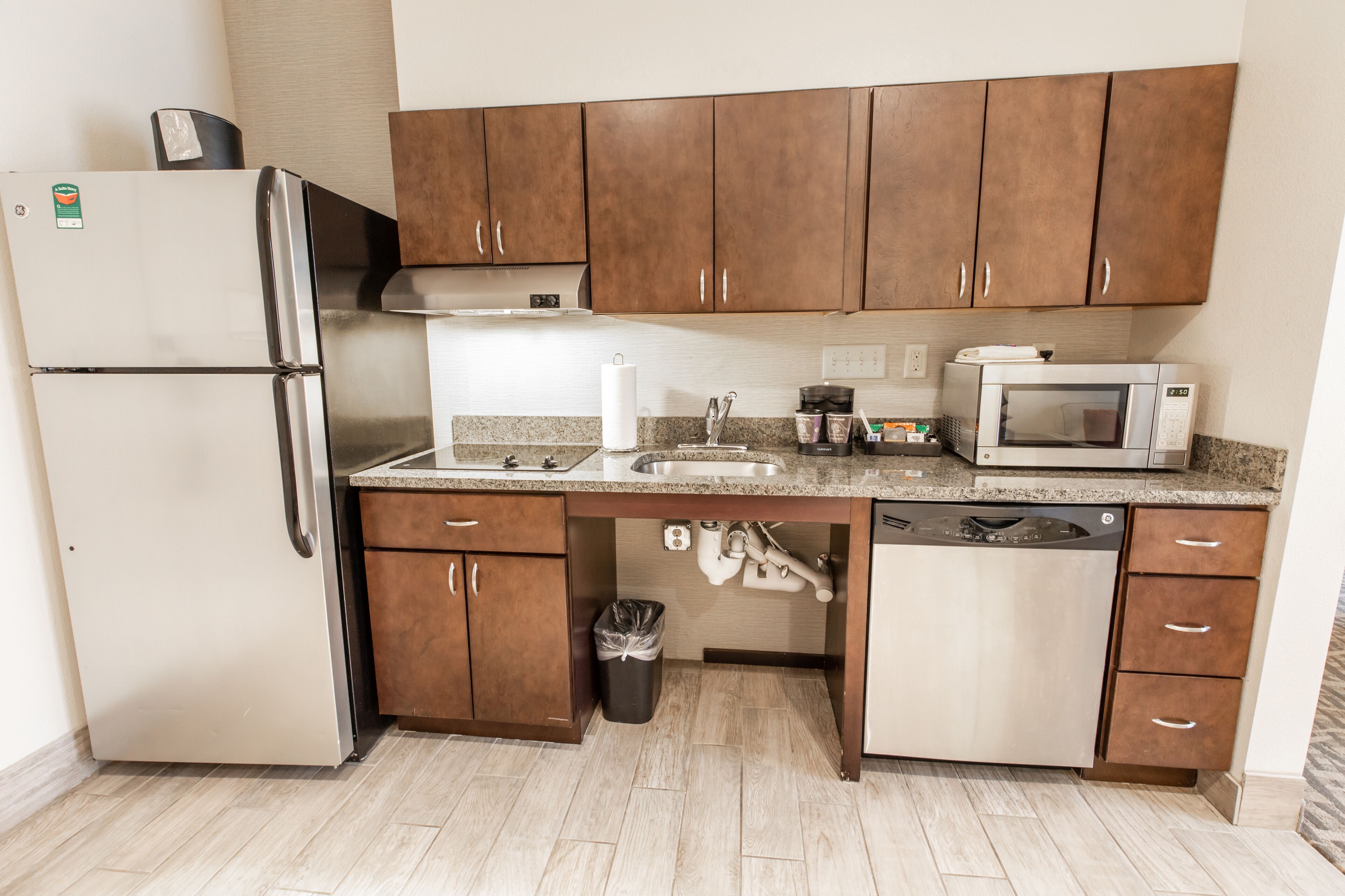 microwave, coffee/tea maker, cookware/dishes/utensils