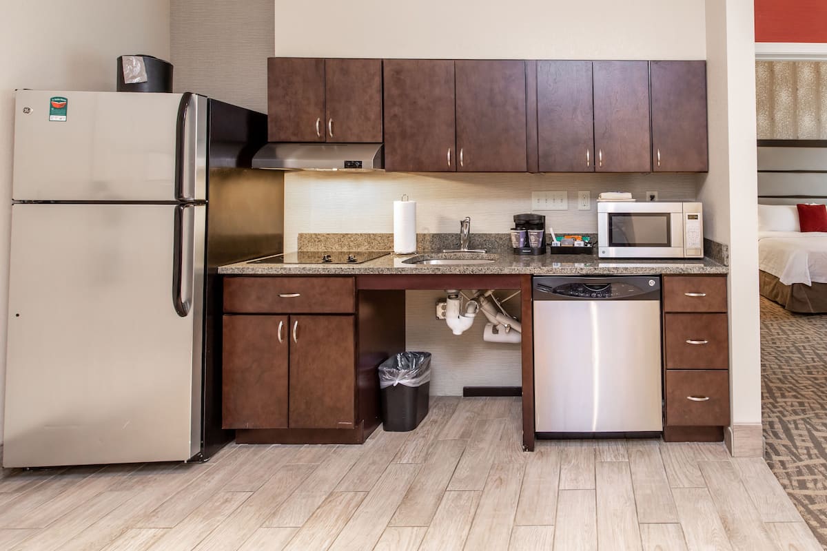 microwave, coffee/tea maker, cookware/dishes/utensils